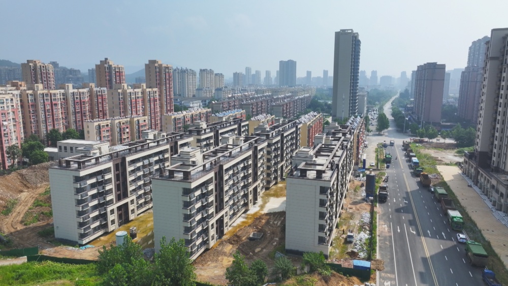 /uploads/image/2025/07/21/afa18c2b5ccbb7ada4cfd2980429d9f6.jpg 图为市幸福春天保障房项目建设现场.jpg